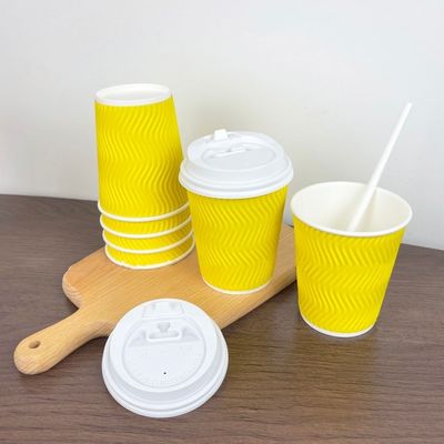 las tazas de papel disponibles de 4oz 120ml 8oz 250ml amarillean las tazas de café con la pared de la ondulación de la tapa